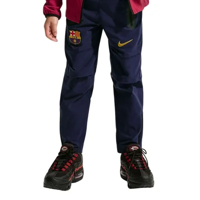 FC Barcelona Tech Woven trainingsbroek kids 2026-2027 donkerblauw geel Nike